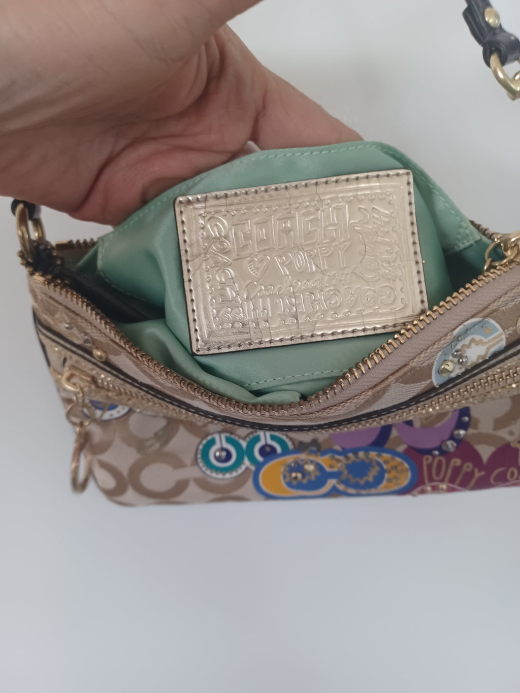 COACH POPPY SIGNATURE JACQUARD WRISTLET (w/COA)