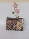 COACH WRISTLET W-FLOWER APPLIQUE